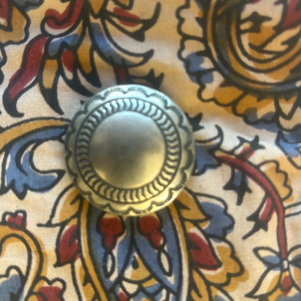 Concho pin